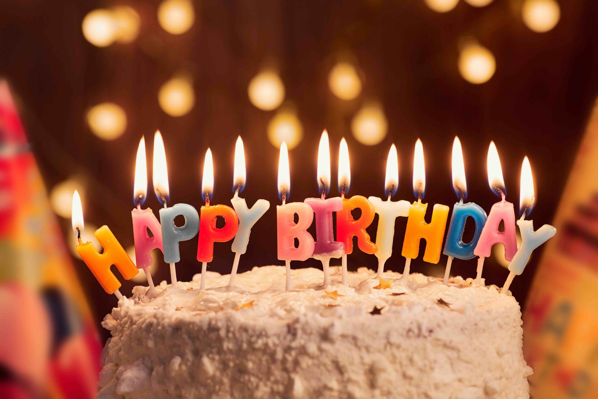 Birthday,Cake,With,Candles,,Bright,Lights,Bokeh celebration